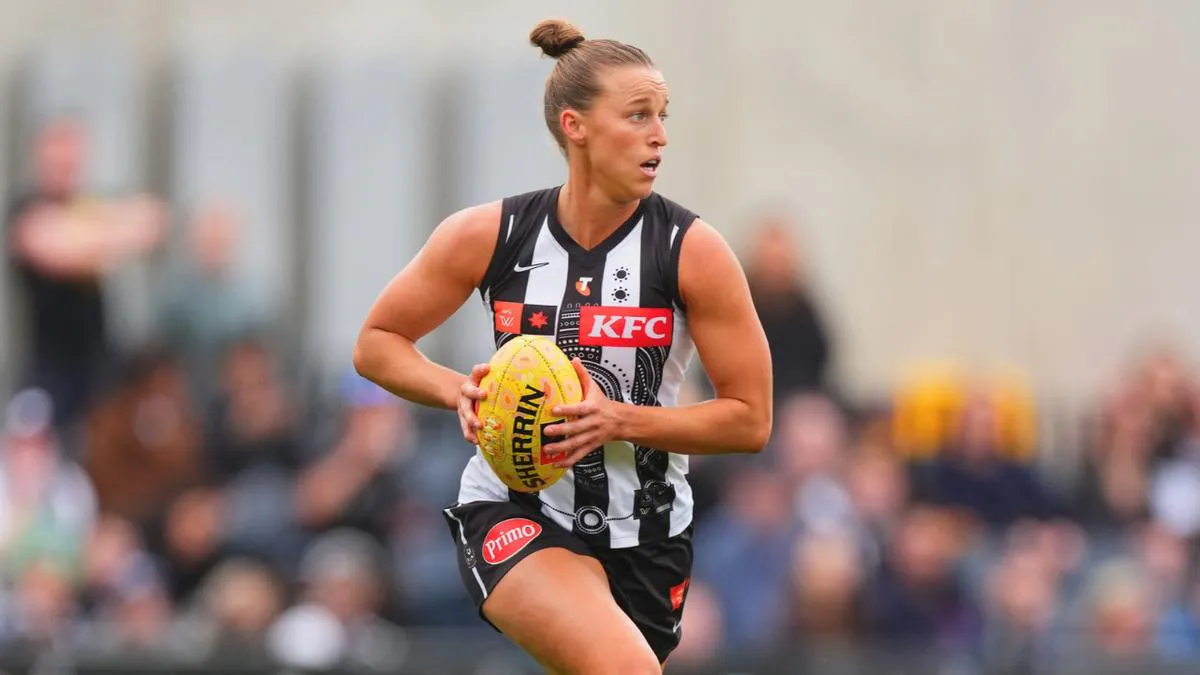 Australian rules football on an oval