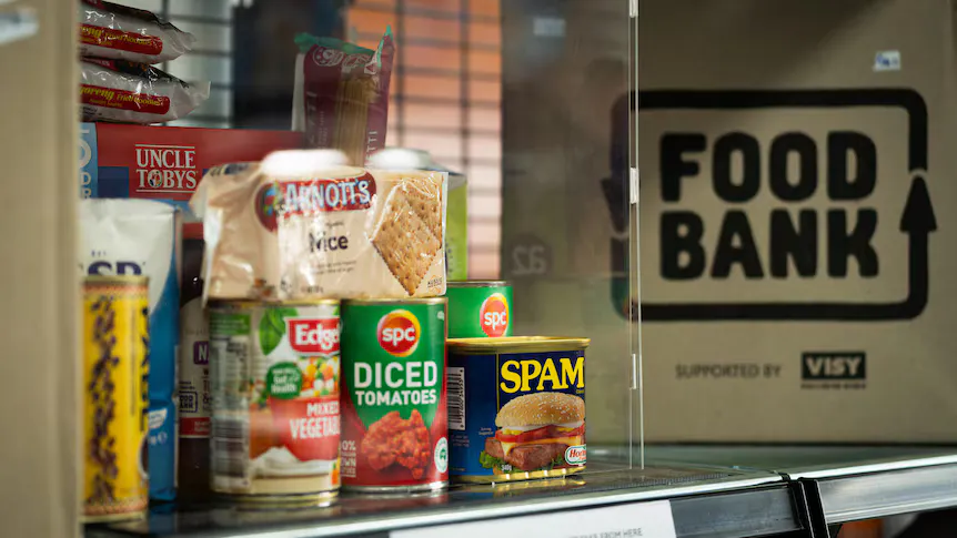 Shelves of groceries and boxes at a food pantry