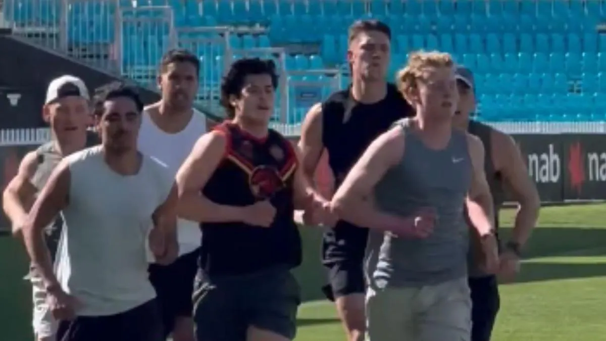 Australian rules footballs on a training oval