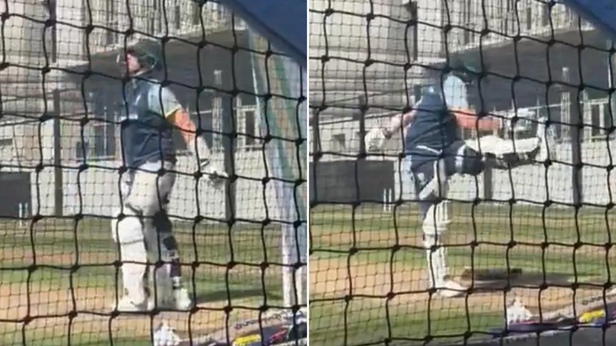 Cricket bat, helmet and gloves beside practice nets
