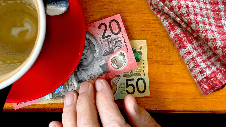 Australian banknotes and coins on a table