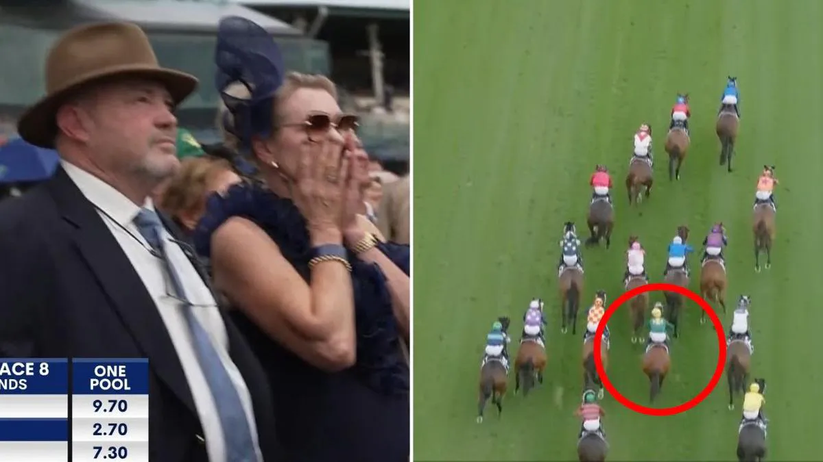 Racehorses and jockeys competing on a turf track