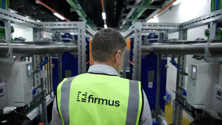 Rows of server cabinets inside a data centre