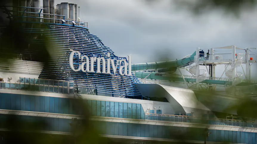 Cruise ship docked beside a passenger terminal